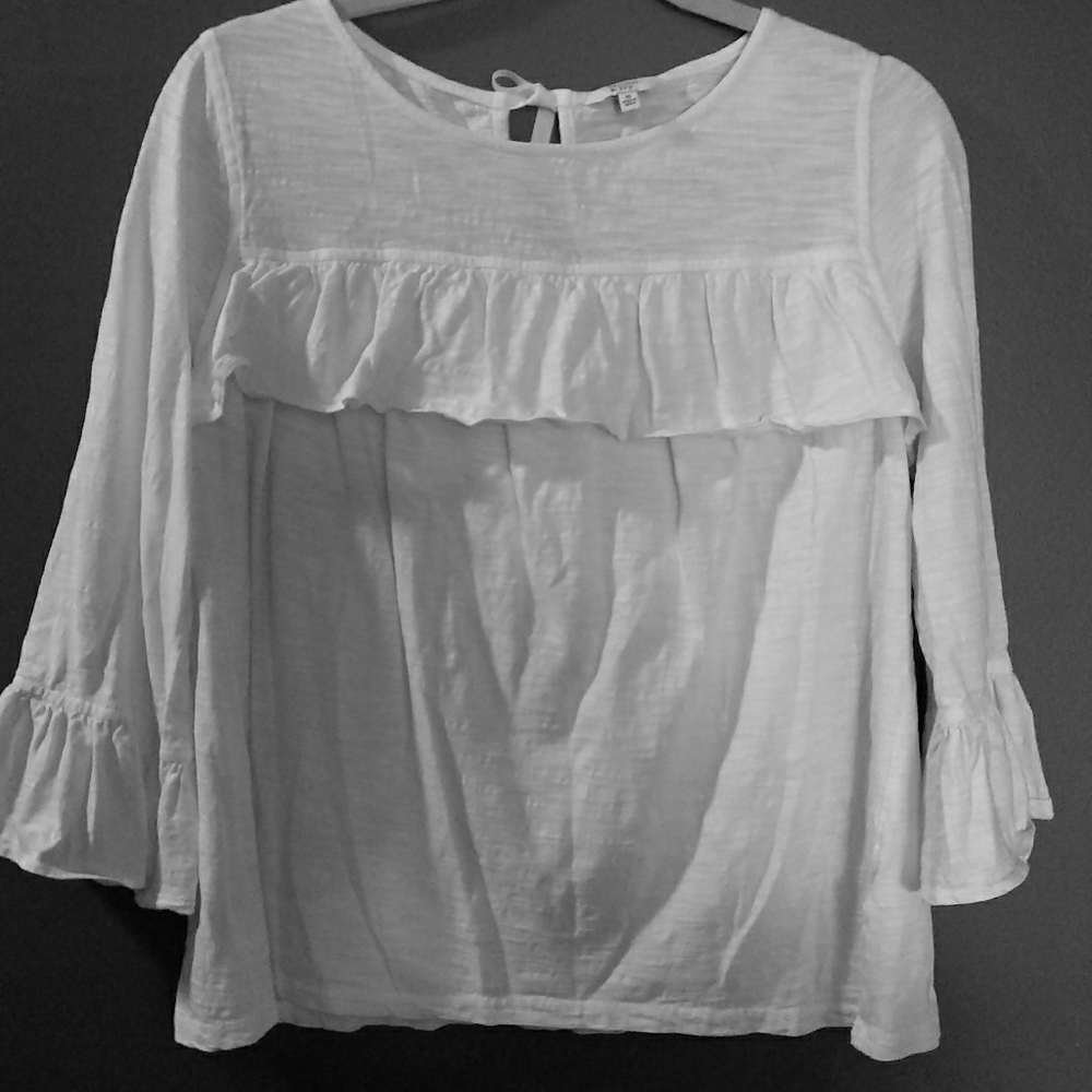 White quarter length bell sleeve blouse